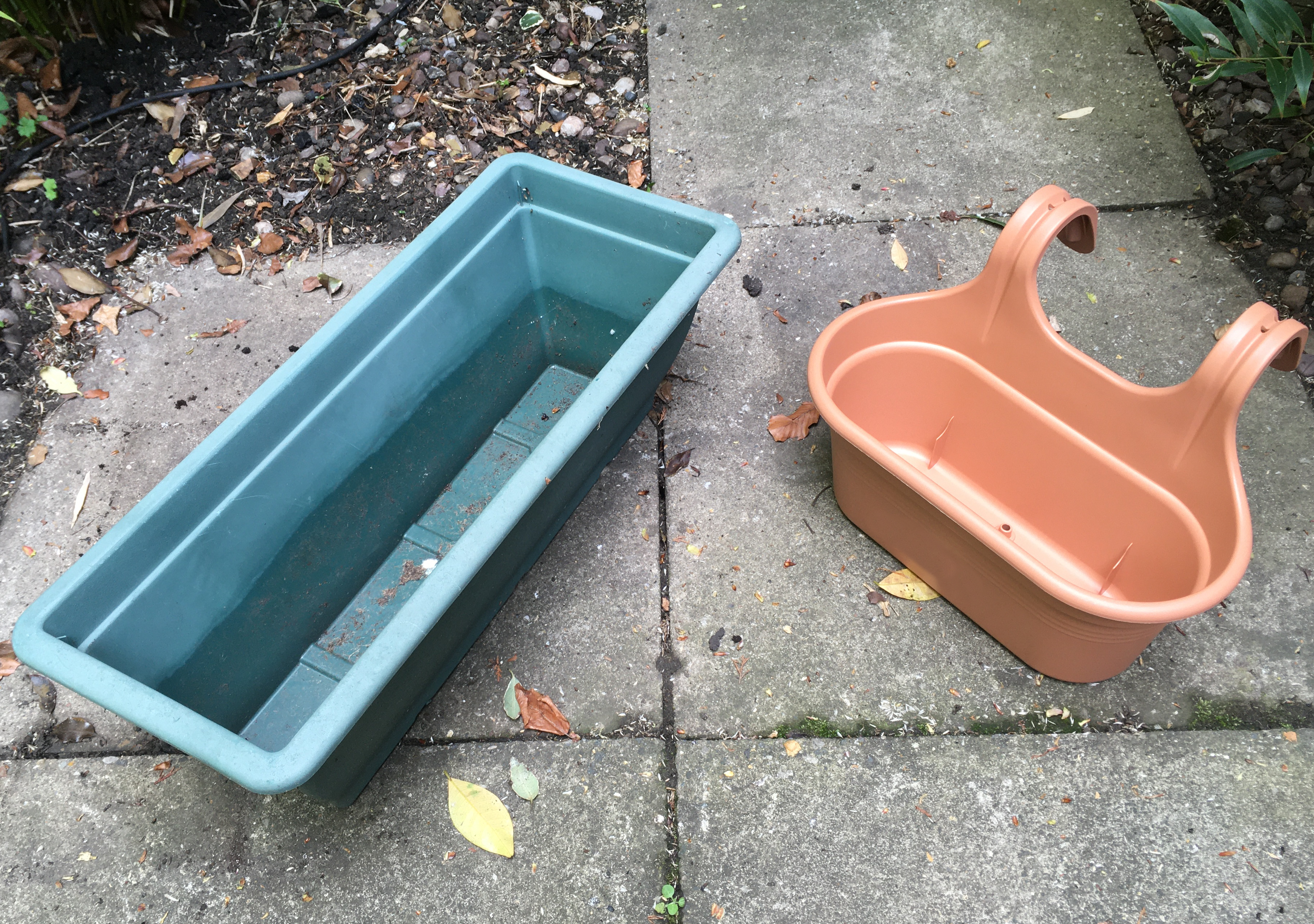 Two plastic planters