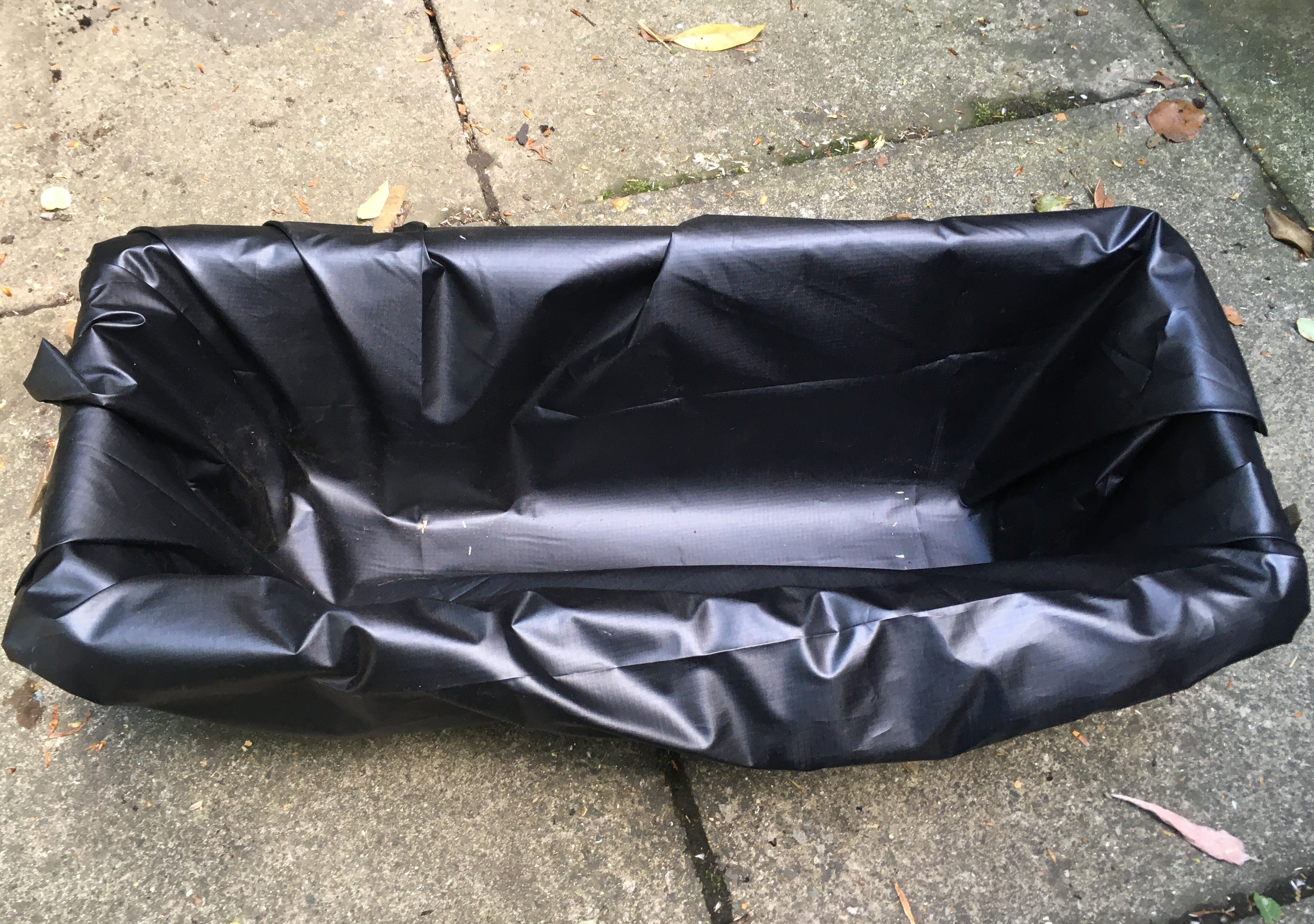 Plastic sheeting inside planter