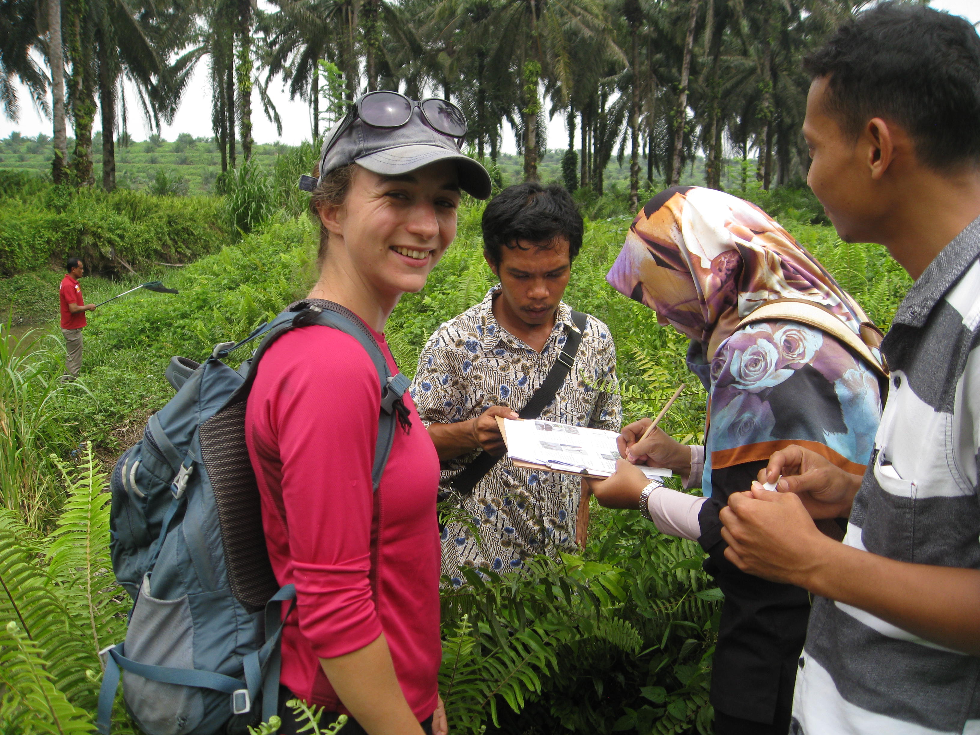 Sarah Luke with collaborators in the field