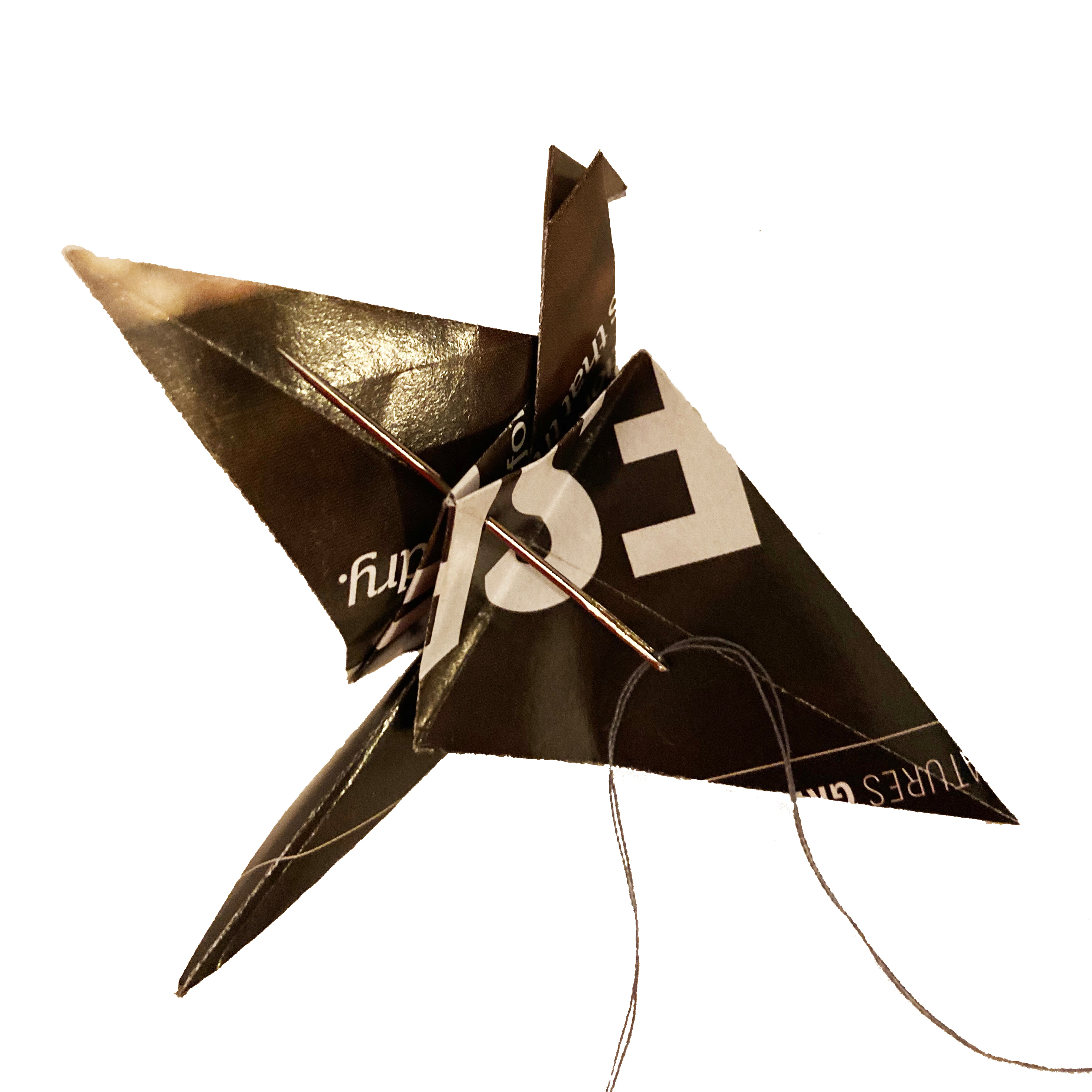 Lacing origami starling with thread