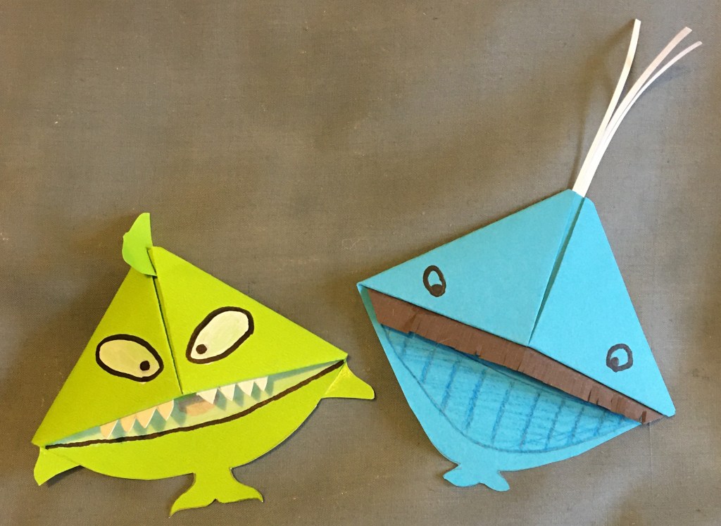 Green whale bookmark example with teeth (like an orca) and blue whale bookmark example with baleen (like a blue whale)