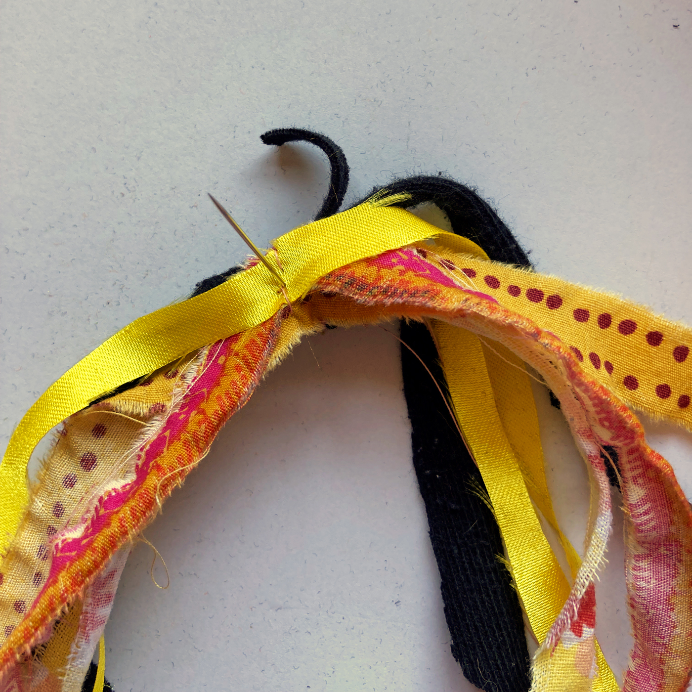 Making the crest from strips of fabric