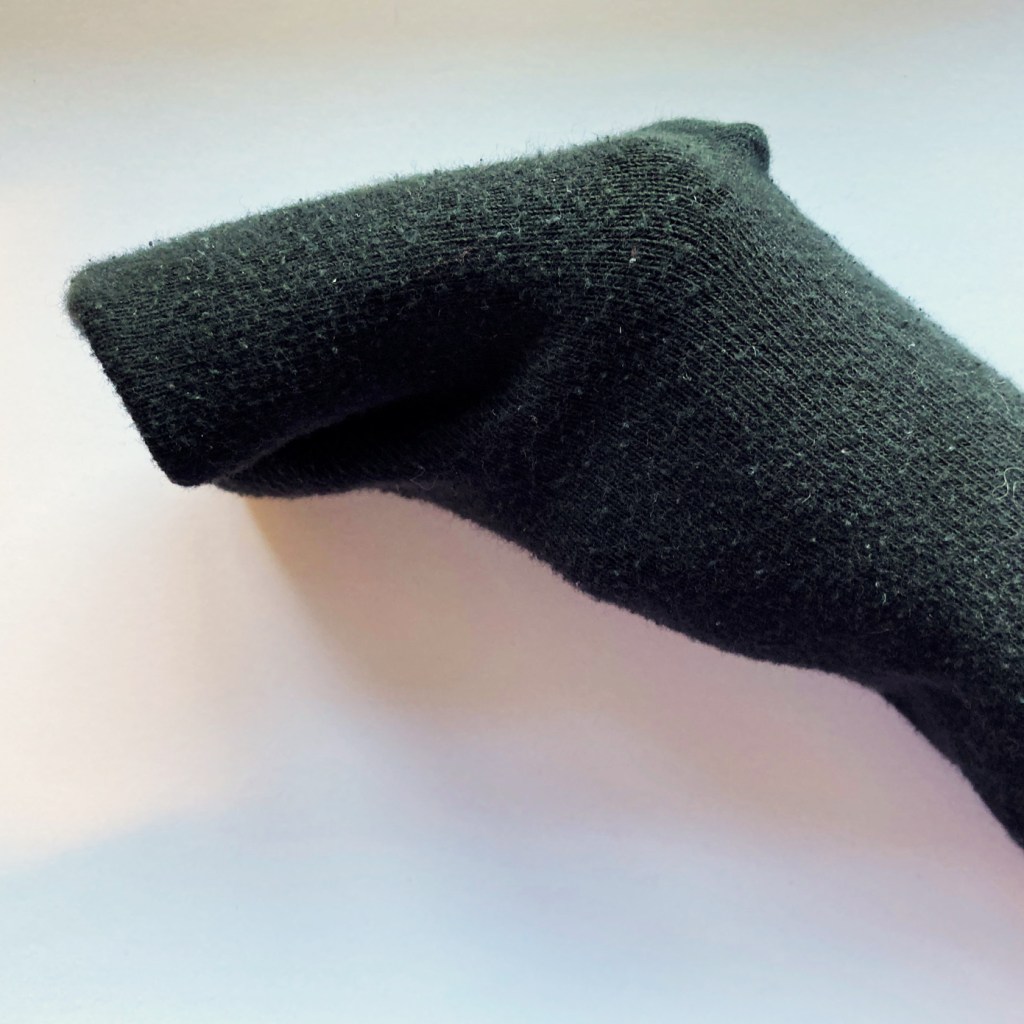 Sock puppet step 1. Turn the toe of the sock in to make a mouth.