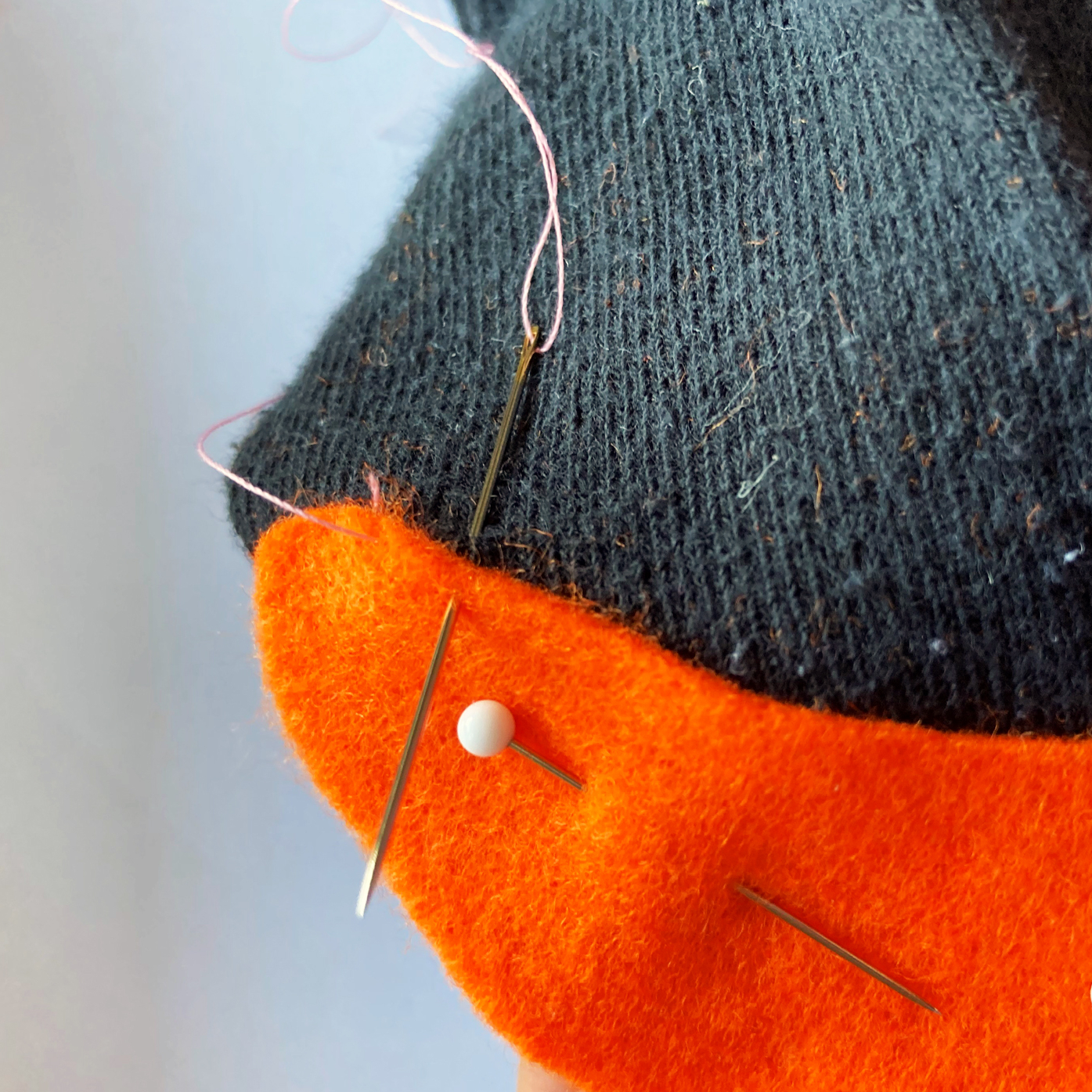 Stitch the beak to the sock