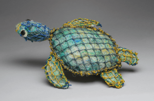Turtle sculpture made from ghost nets