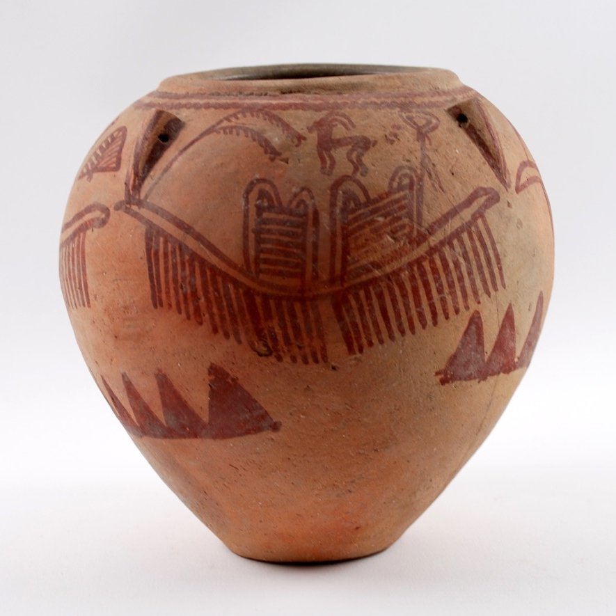 Terracotta-coloured ceramic jar with patterns painted in red