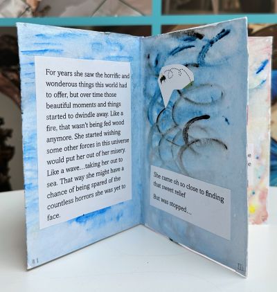 Sindie zine with story and swirling blue images